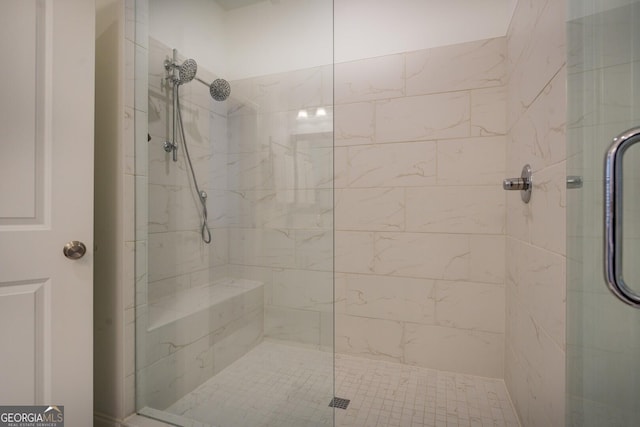 bathroom featuring a shower stall