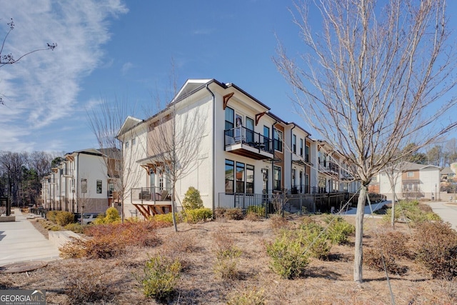 view of property with a residential view