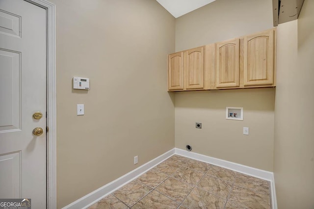 laundry area with cabinet space, hookup for an electric dryer, baseboards, and washer hookup