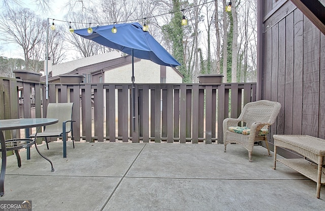 view of patio with fence