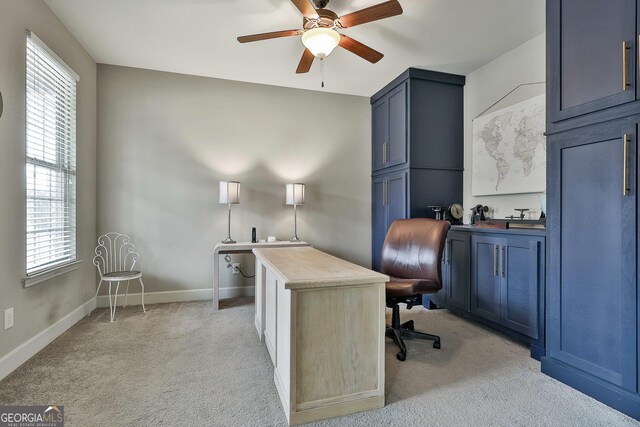 114 Austin Storey Cir, Newnan, GA 30263 - home office featuring a ceiling fan, light colored carpet, and healthy amount of natural light