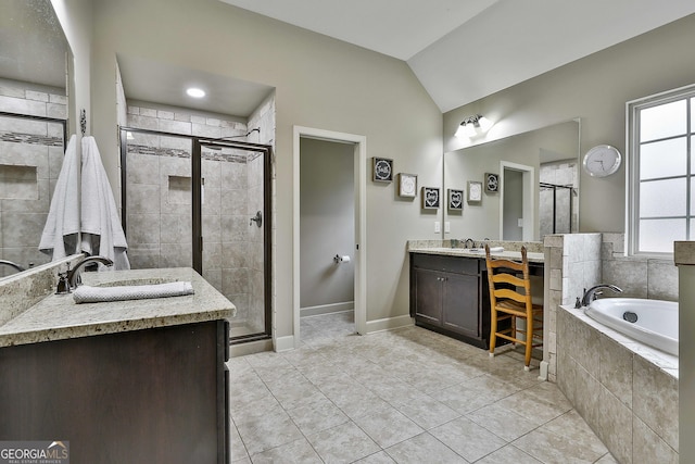 full bathroom with tile patterned flooring, lofted ceiling, a stall shower, a bath, and vanity