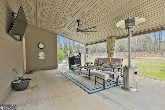 view of patio / terrace featuring an outdoor living space and a ceiling fan