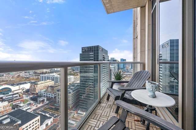 balcony featuring a city view