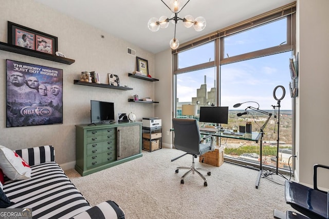 carpeted office space featuring a chandelier, floor to ceiling windows, visible vents, and baseboards