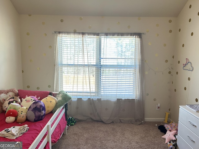 carpeted bedroom featuring wallpapered walls