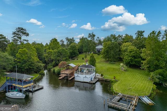 exterior space with a water view