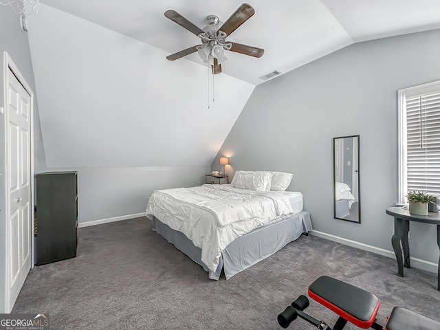 bedroom featuring lofted ceiling, carpet, visible vents, and baseboards