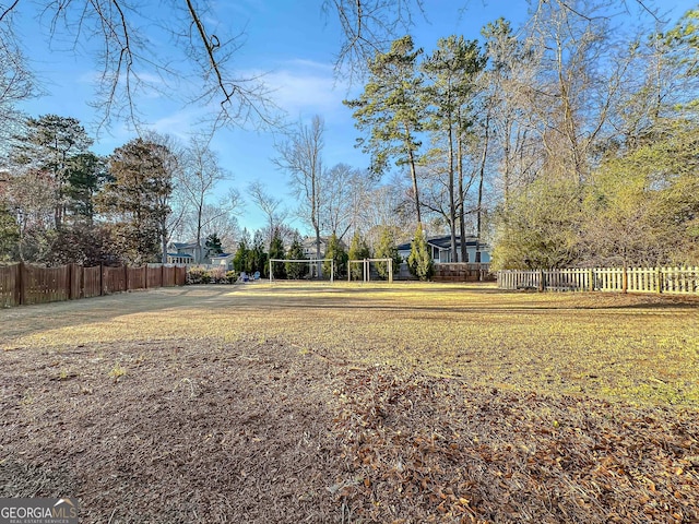 view of yard featuring fence