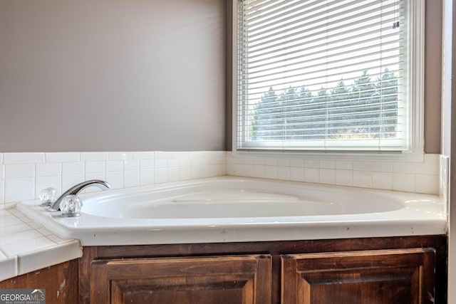 bathroom featuring a garden tub