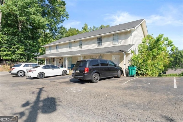 view of front of property featuring uncovered parking