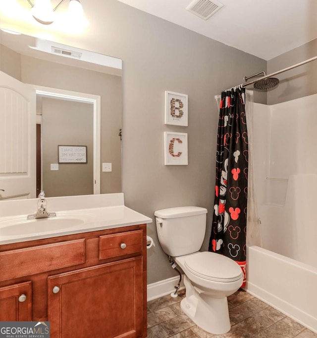 full bath featuring toilet, shower / bath combo, vanity, and visible vents