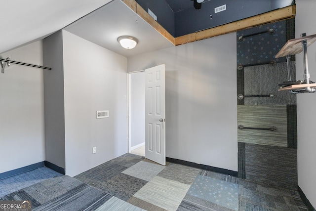 interior space featuring visible vents and baseboards