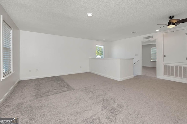 137 Walnut Way, Kingsland, GA 31548 - carpeted empty room featuring a ceiling fan, baseboards, a textured ceiling, and recessed lighting