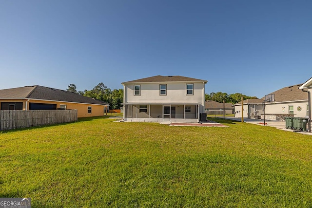 137 Walnut Way, Kingsland, GA 31548 - back of property featuring a sunroom