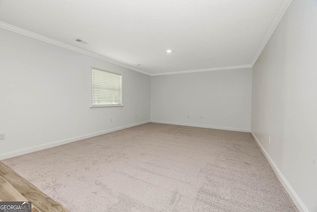 137 Walnut Way, Kingsland, GA 31548 - empty room featuring ornamental molding, baseboards, light colored carpet, and recessed lighting