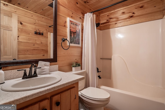 bathroom featuring toilet, shower / tub combo, vanity, and wooden walls