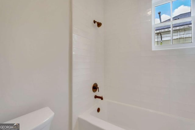 full bathroom with shower / bathing tub combination and toilet