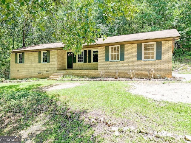 3209 Wax Rd SE, Aragon, GA 30104 - single story home featuring brick siding, a front lawn, and crawl space