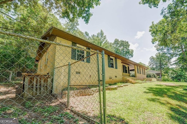 3209 Wax Rd SE, Aragon, GA 30104 - view of property exterior with a lawn, brick siding, and crawl space