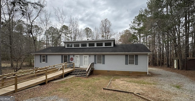 view of front of house featuring a deck and crawl space