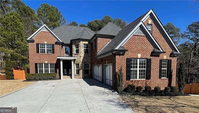 3499 Lake Mill Rd, Buford, GA 30519 - view of front of house featuring brick siding, driveway, a garage, and a shingled roof