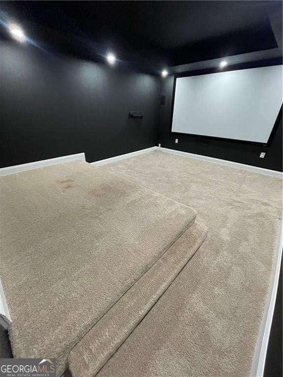3499 Lake Mill Rd, Buford, GA 30519 - carpeted home theater with baseboards