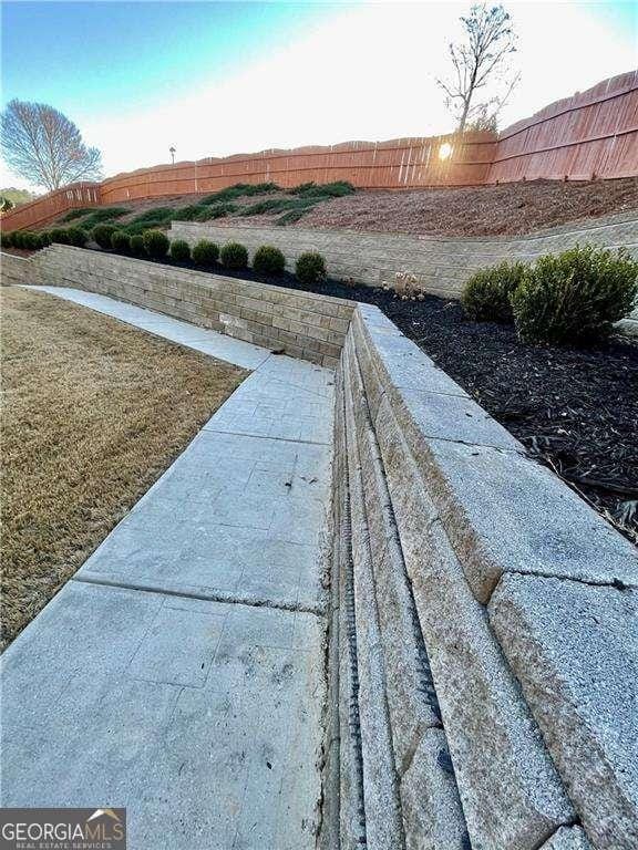 details with a fenced backyard