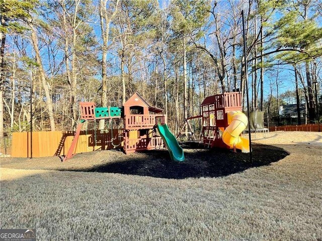 view of play area featuring fence