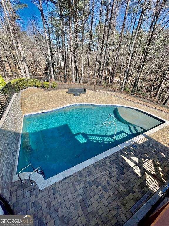 3499 Lake Mill Rd, Buford, GA 30519 - outdoor pool with a patio