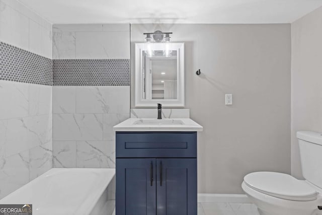 full bath with marble finish floor, vanity, toilet, and baseboards