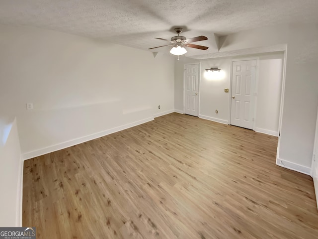 832 Overlook Trl, Canton, GA 30115 - spare room featuring a ceiling fan, a textured ceiling, and wood finished floors