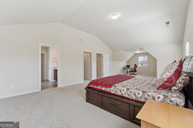 bedroom with visible vents, lofted ceiling, light colored carpet, and baseboards