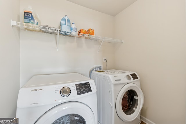 laundry area featuring laundry area and independent washer and dryer