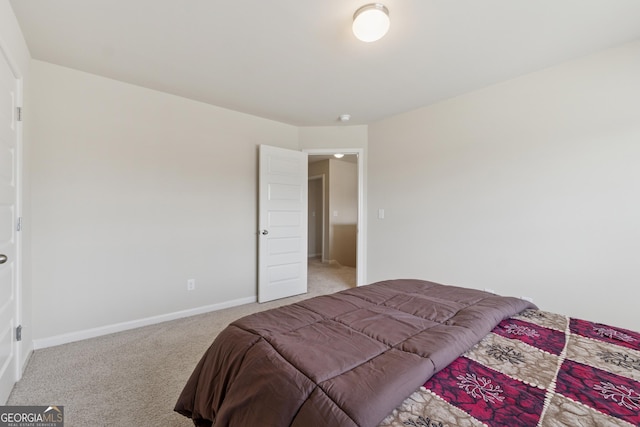 carpeted bedroom with baseboards