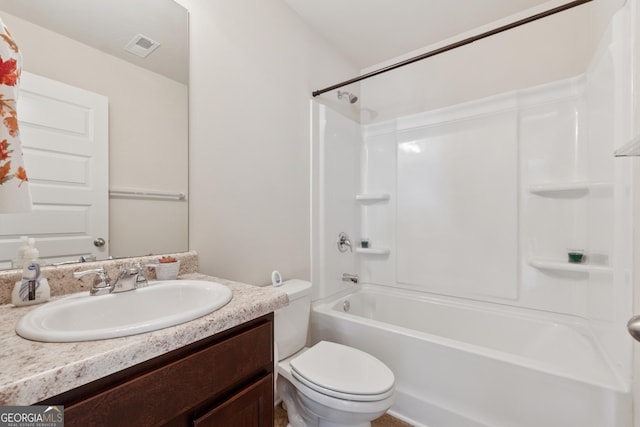 bathroom with tub / shower combination, visible vents, toilet, and vanity