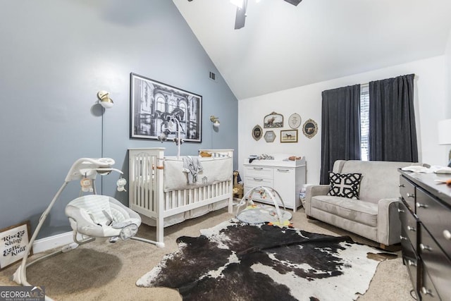 bedroom featuring high vaulted ceiling, carpet flooring, visible vents, and a ceiling fan