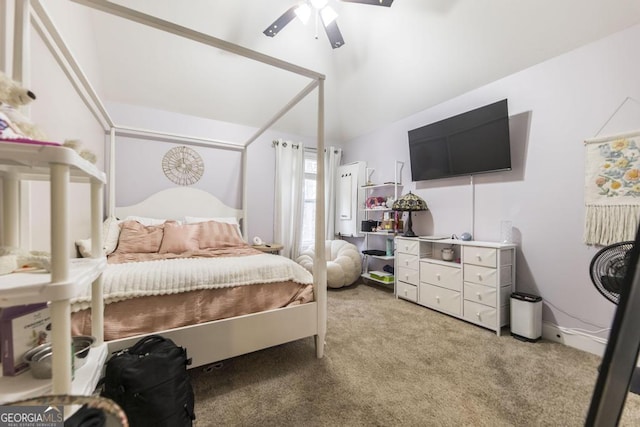 carpeted bedroom with vaulted ceiling and ceiling fan