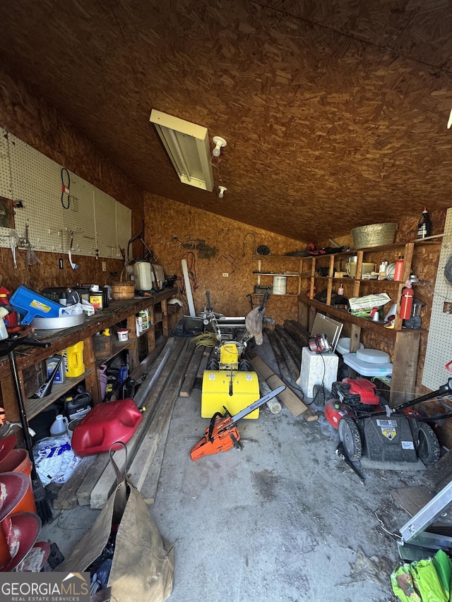 garage with a workshop area