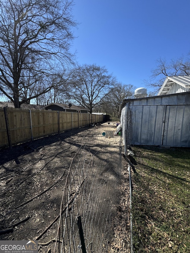 view of yard with fence