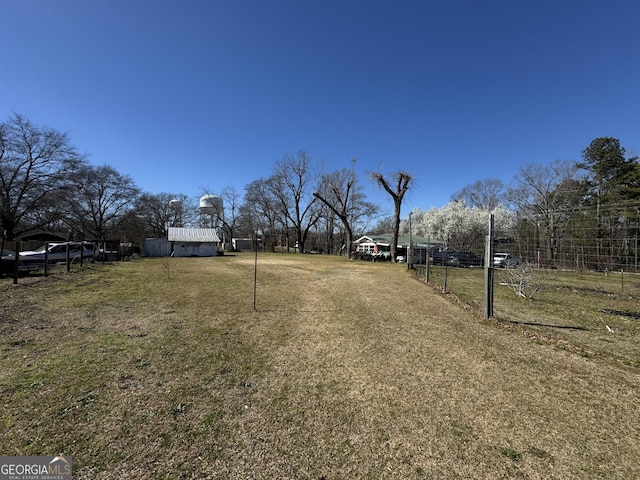 view of yard featuring fence