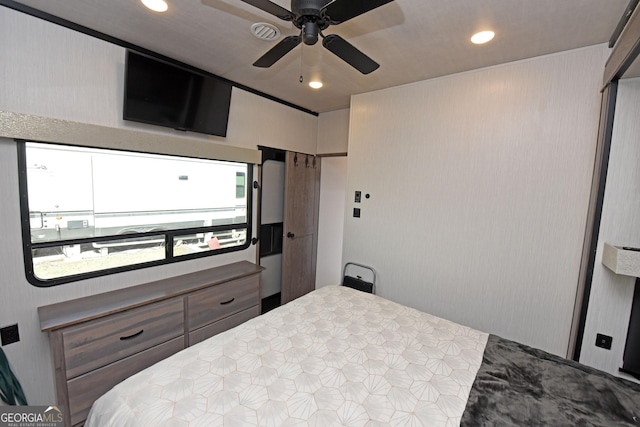 bedroom with a ceiling fan and recessed lighting