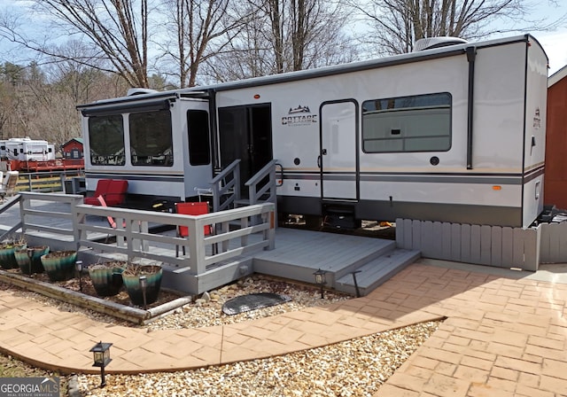 exterior space featuring a sunroom