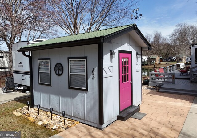 view of outbuilding featuring an outdoor structure