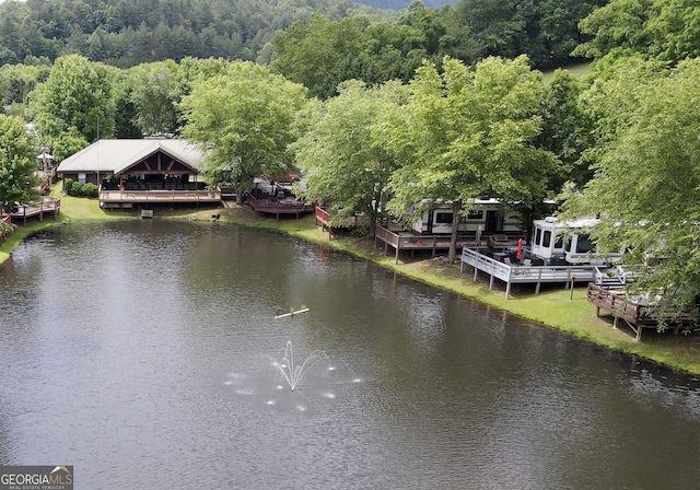 water view with a wooded view