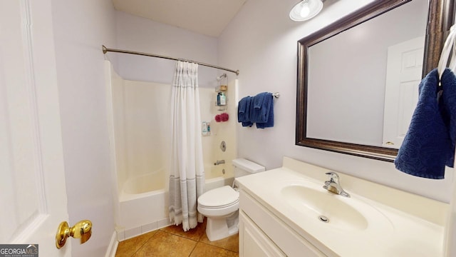 full bath with shower / bath combo, vanity, toilet, and tile patterned floors