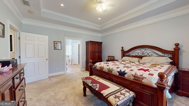 bedroom featuring light carpet, ornamental molding, a raised ceiling, and visible vents