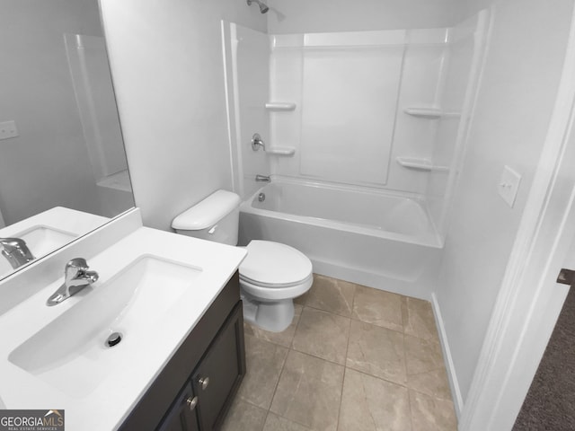 full bath featuring bathing tub / shower combination, vanity, toilet, and baseboards