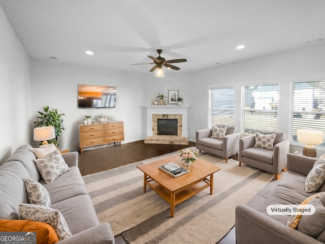 362 Reserve Overlook, Canton, GA 30115 - living room featuring wood finished floors, a ceiling fan, a brick fireplace, and recessed lighting