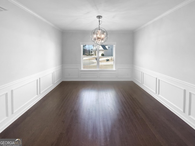 362 Reserve Overlook, Canton, GA 30115 - unfurnished dining area with a chandelier, dark wood-style floors, wainscoting, ornamental molding, and a decorative wall